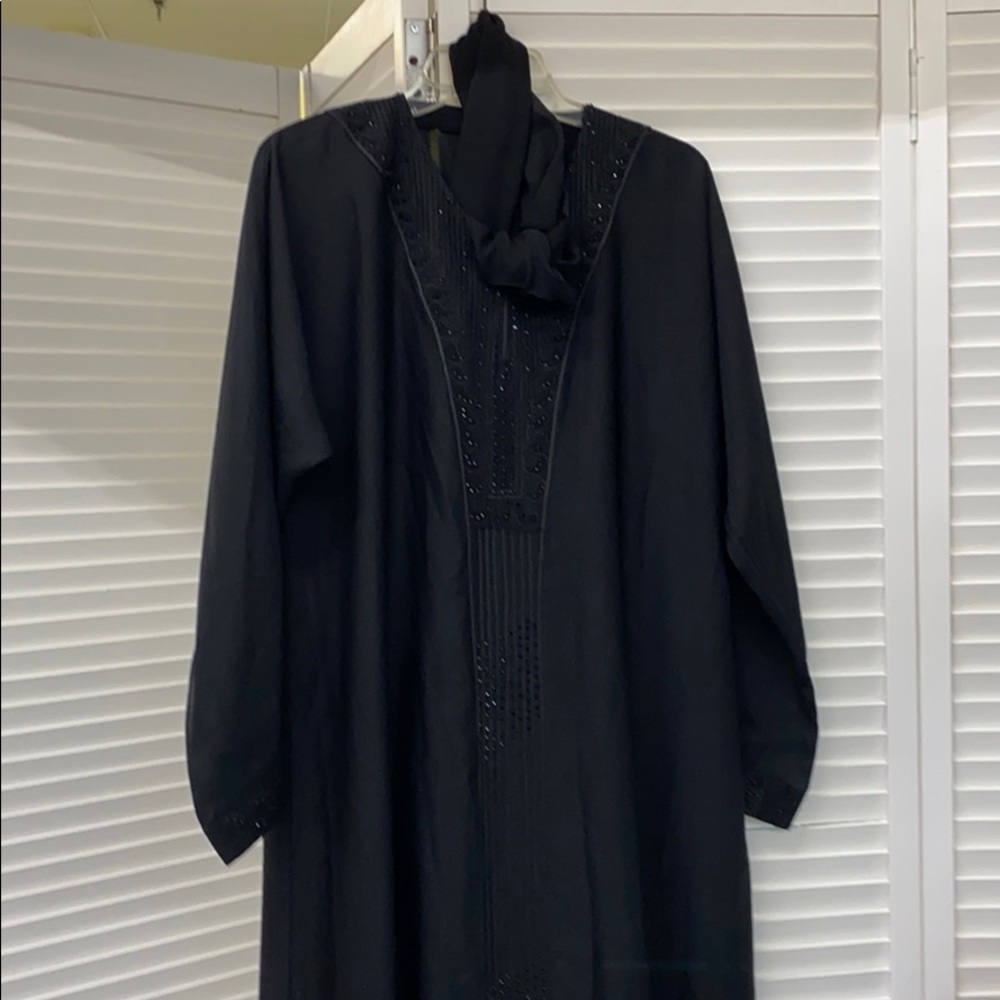 Abayah , full length dress.